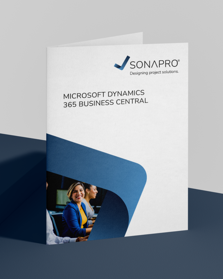 Das Bild zeigt die Business Central Broschüre auf dunklem Tisch und hellem Hintergrund